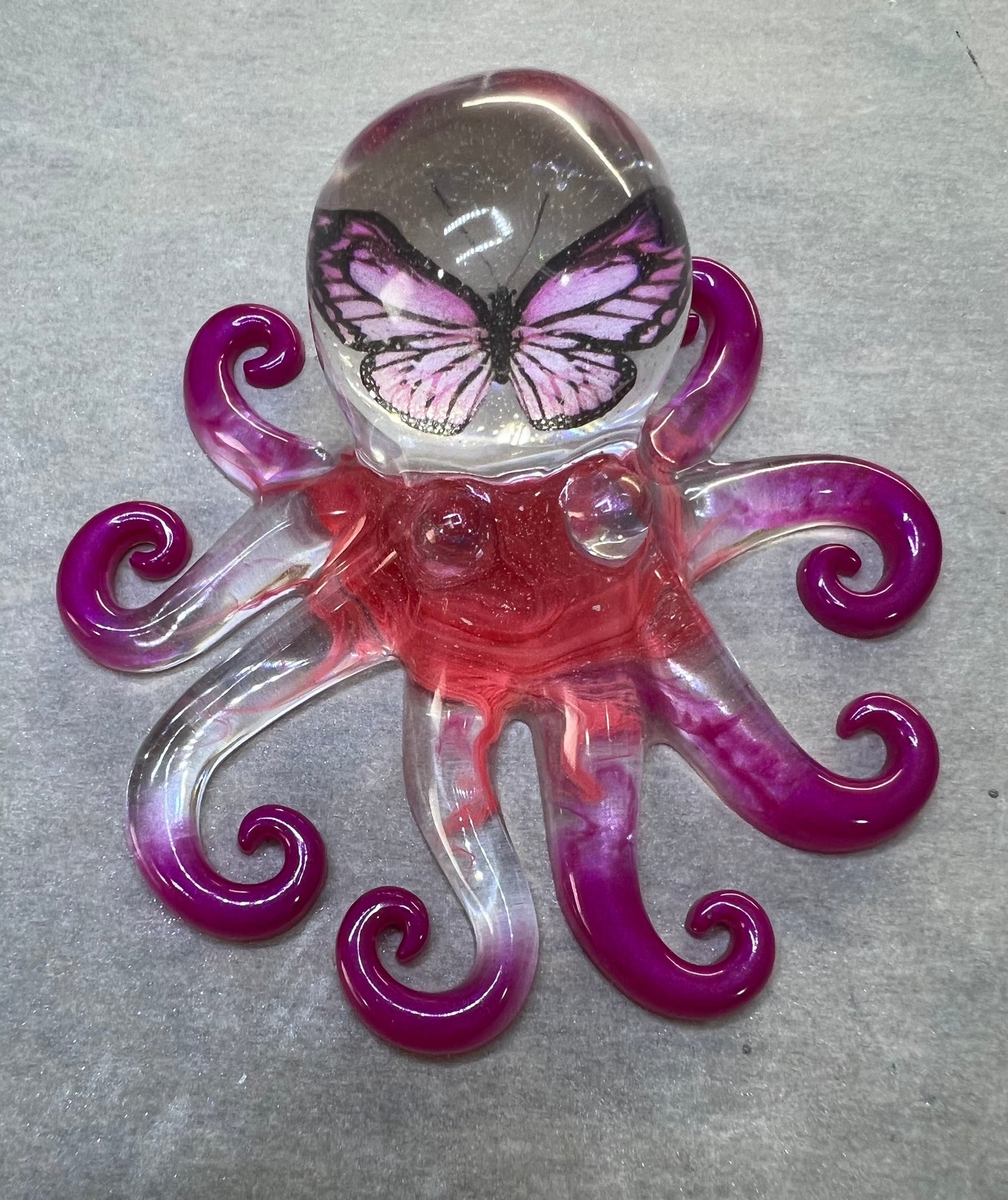 Octopus with pink butterfly