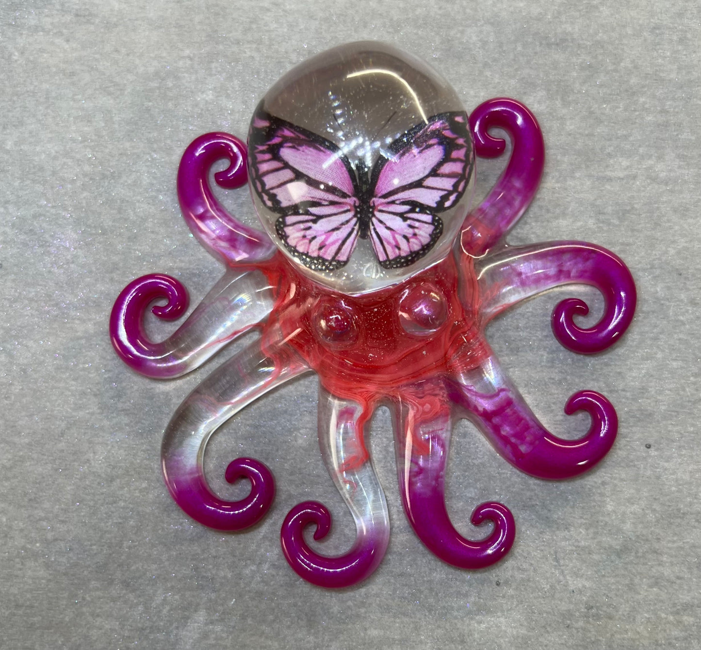 Octopus with pink butterfly